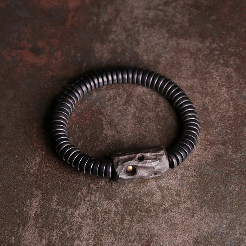 Pulsera de equilibrio perforada con Buddha Stones, madera de ébano, cobre y latón