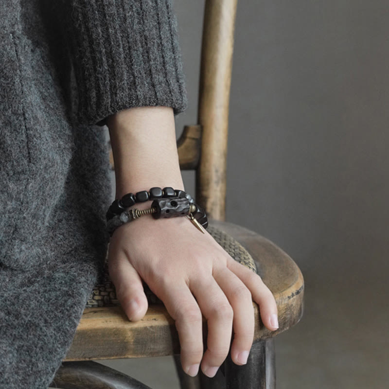 Pulsera de equilibrio de doble vuelta con Buddha Stones, madera de ébano, cuarzo rutilado negro, cobre y latón