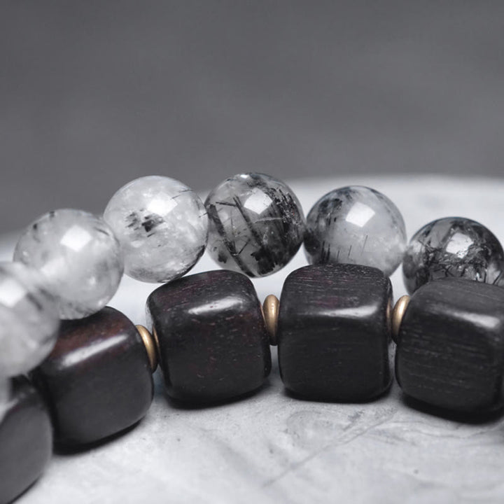 Pulsera de equilibrio de doble vuelta con Buddha Stones, madera de ébano, cuarzo rutilado negro, cobre y latón