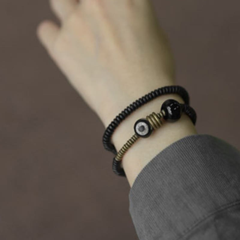 Pulsera de doble vuelta con cuentas Dzi de latón, cobre, sándalo verde, madera de ébano y Buddha Stones