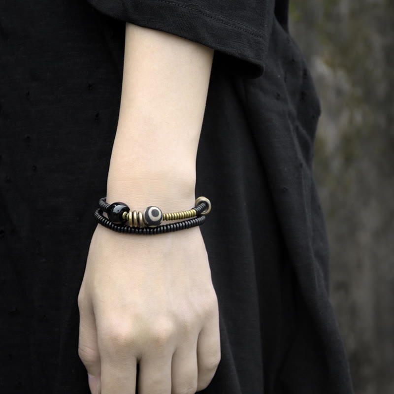 Pulsera de doble vuelta con cuentas Dzi de latón, cobre, sándalo verde, madera de ébano y Buddha Stones