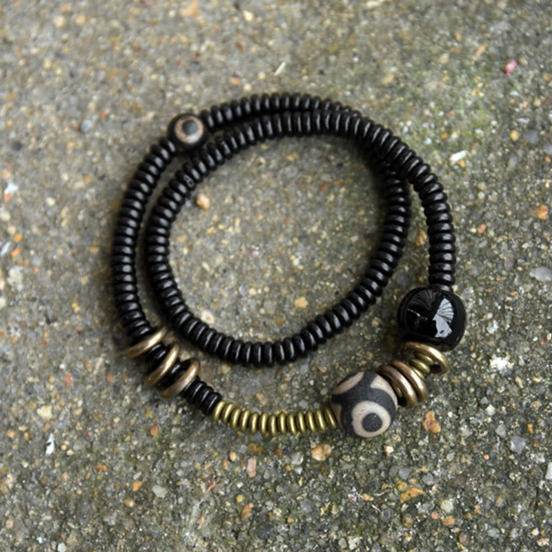 Pulsera de doble vuelta con cuentas Dzi de latón, cobre, sándalo verde, madera de ébano y Buddha Stones
