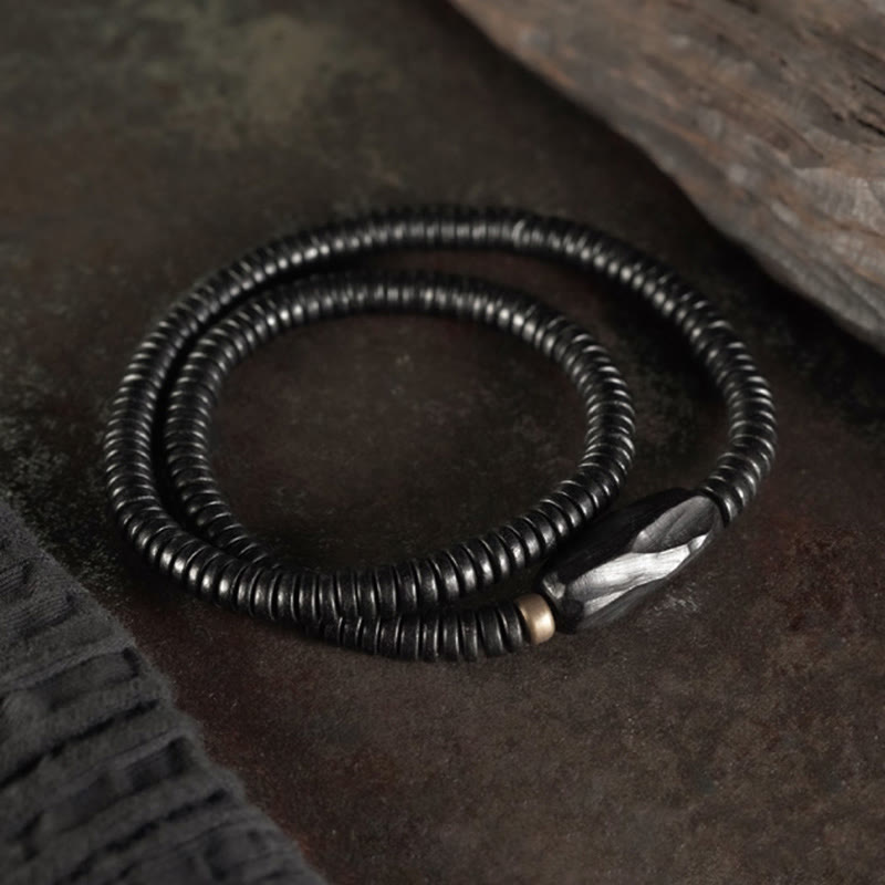 Pulsera de triple vuelta con Buddha Stones, madera de ébano, cobre y latón