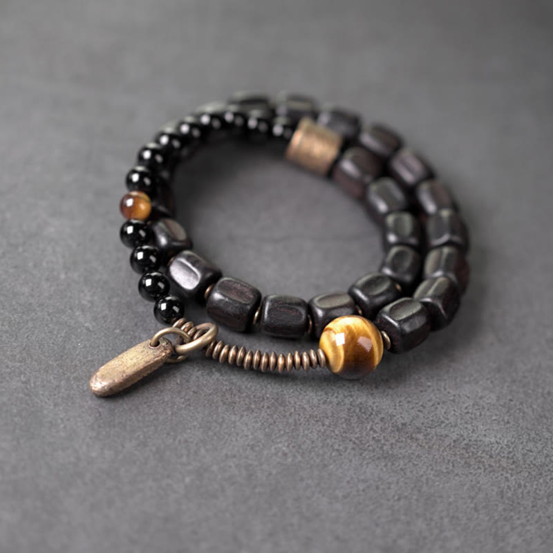 Pulsera de doble vuelta con Buddha Stones, madera de ébano, cobre, latón y ojo de tigre
