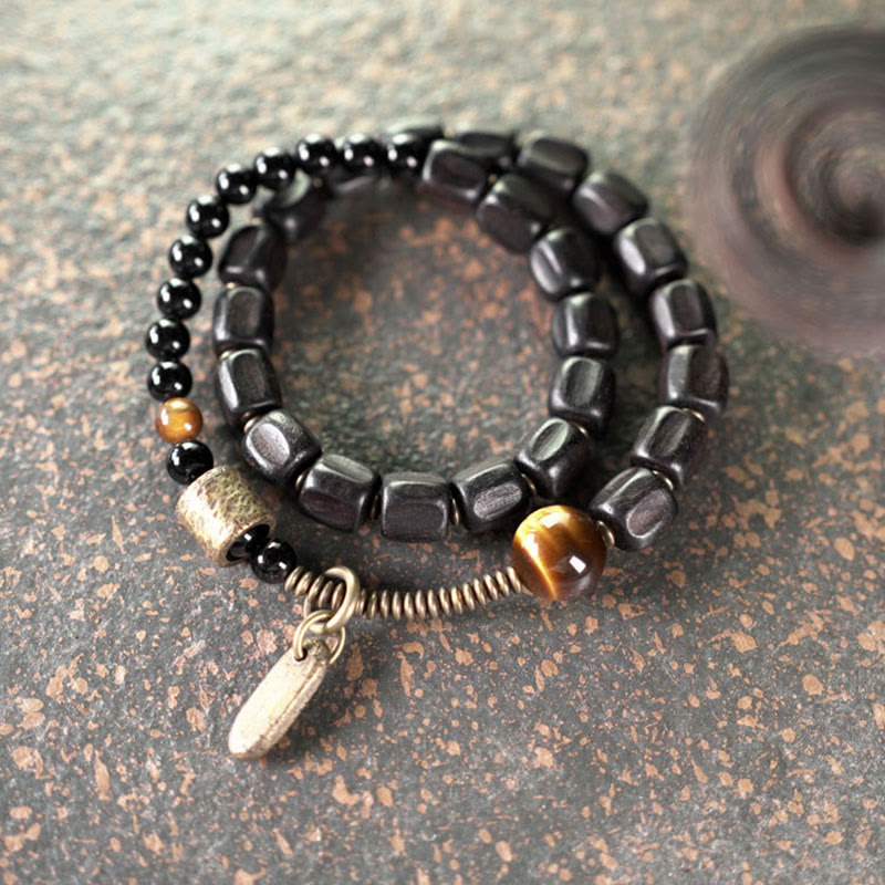 Pulsera de doble vuelta con Buddha Stones, madera de ébano, cobre, latón y ojo de tigre