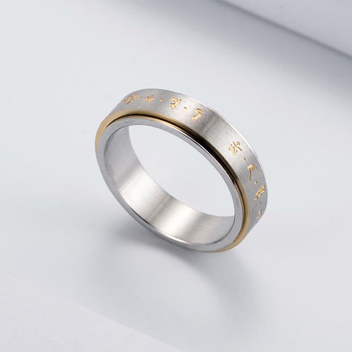 Anillo giratorio de equilibrio de acero y titanio con mantra tibetano y Buddha Stones