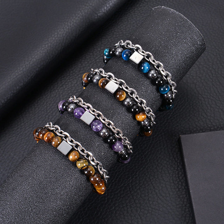 Pulsera de protección de doble envoltura de acero y titanio con magnetita negra y piedra esmerilada de ojo de tigre de colores de Buddha Stones