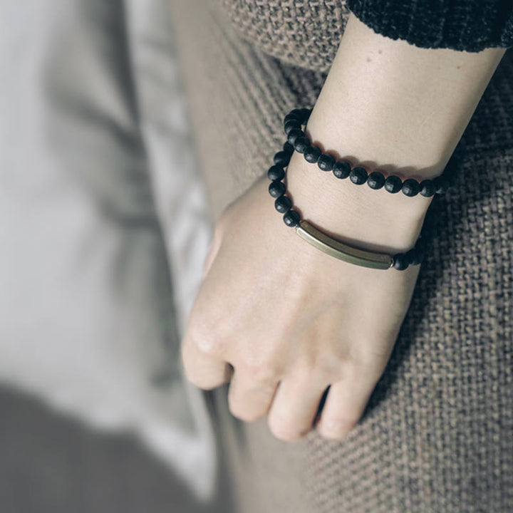 Pulsera protectora de doble vuelta con Buddha Stones, superficie cortada esmerilada, ónix negro, cobre y latón