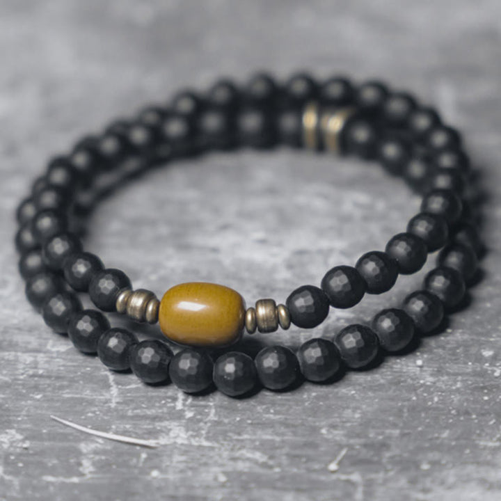 Pulsera protectora de doble envoltura con cuentas de topacio ónix negro y superficie cortada esmerilada con Buddha Stones