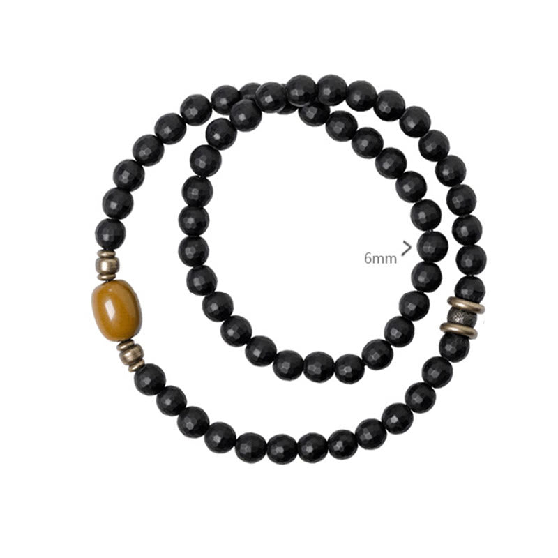 Pulsera protectora de doble envoltura con cuentas de topacio ónix negro y superficie cortada esmerilada con Buddha Stones
