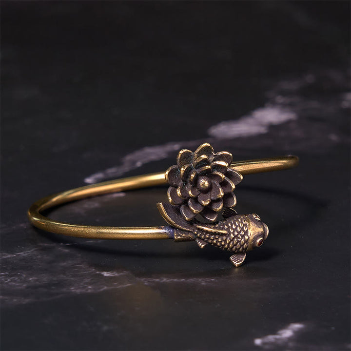 Pulsera de cobre y latón con Buddha Stones , flor de loto, pez koi y iluminación