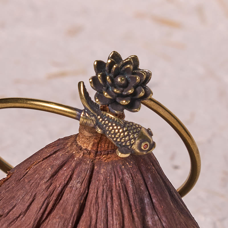 Pulsera de cobre y latón con Buddha Stones , flor de loto, pez koi y iluminación