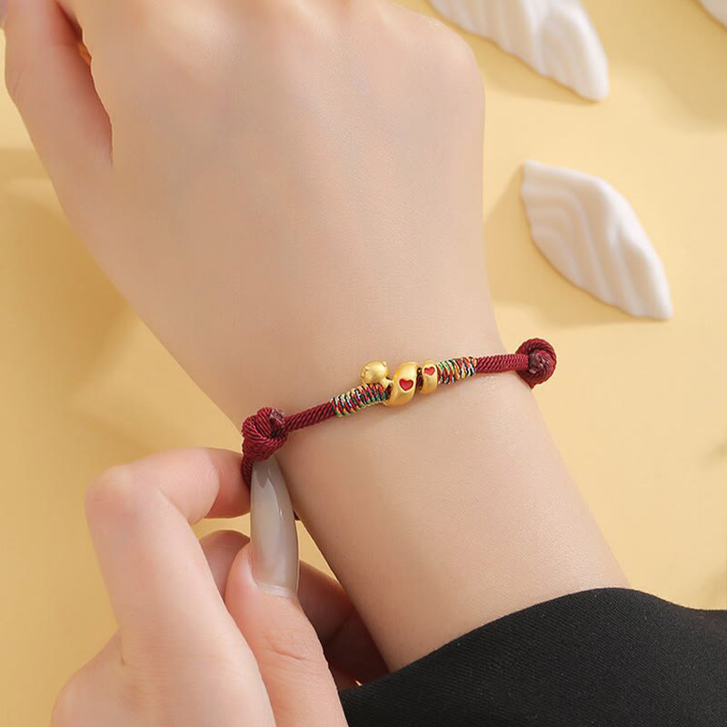 Pulsera trenzada de protección del año de la serpiente con hilo rojo y aleación de cobre y Buddha Stones