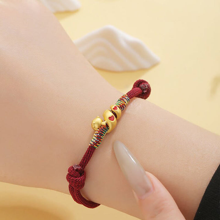 Pulsera trenzada de protección del año de la serpiente con hilo rojo y aleación de cobre y Buddha Stones