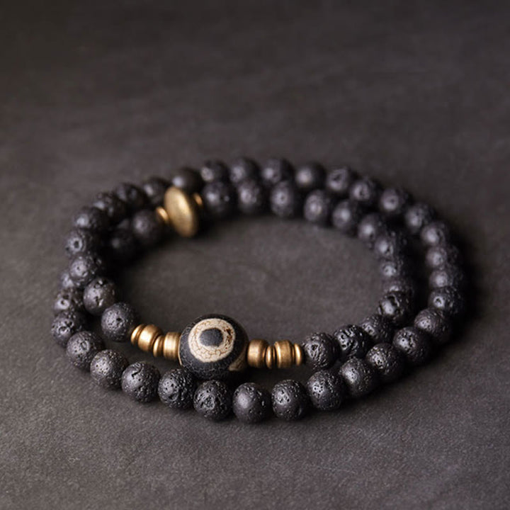 Pulsera curativa de doble vuelta con cuentas de latón y cobre de tres ojos de piedra de lava vintage de Buddha Stones