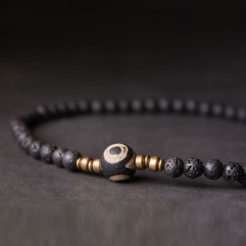 Pulsera curativa de doble vuelta con cuentas de latón y cobre de tres ojos de piedra de lava vintage de Buddha Stones