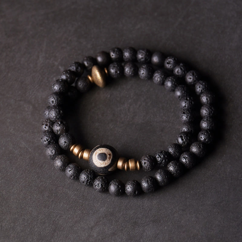 Pulsera curativa de doble vuelta con cuentas de latón y cobre de tres ojos de piedra de lava vintage de Buddha Stones