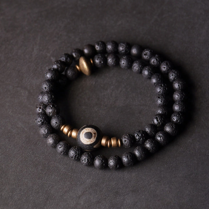 Pulsera curativa de doble vuelta con cuentas de latón y cobre de tres ojos de piedra de lava vintage de Buddha Stones