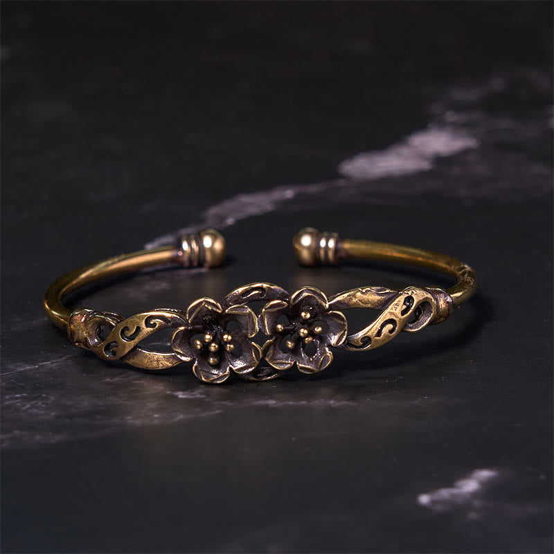 Brazalete de cobre y latón con Buddha Stones, flores, hojas y suerte para la curación