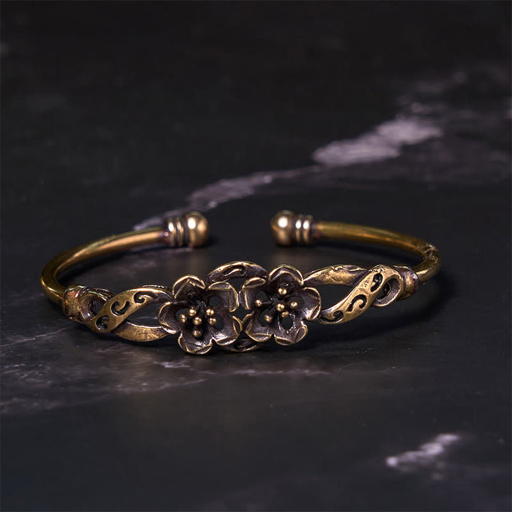 Brazalete de cobre y latón con Buddha Stones, flores, hojas y suerte para la curación