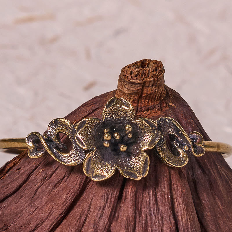 Brazalete de cobre y latón con Buddha Stones, flores, hojas y suerte para la curación