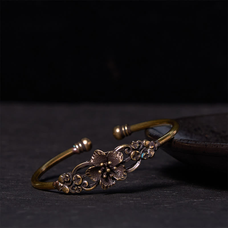 Brazalete de cobre y latón con Buddha Stones, flores, hojas y suerte para la curación