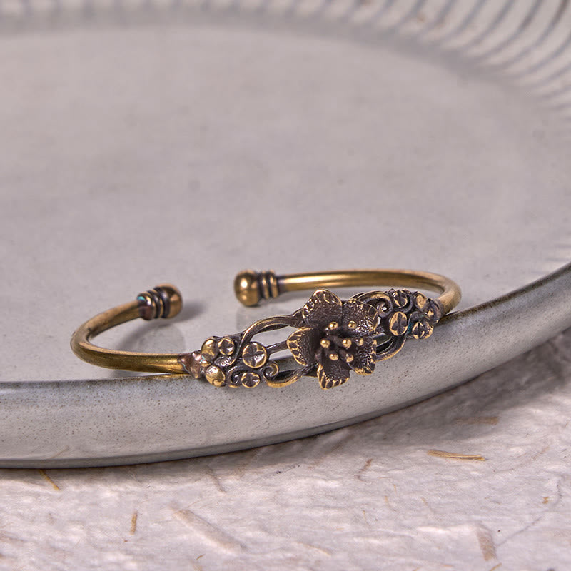 Brazalete de cobre y latón con Buddha Stones, flores, hojas y suerte para la curación