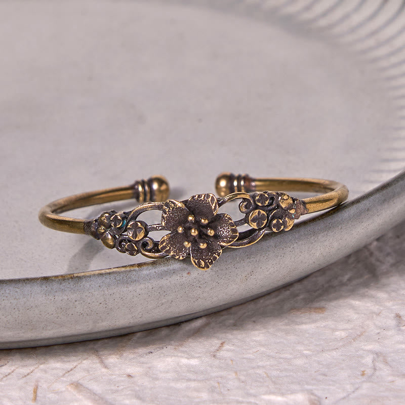 Brazalete de cobre y latón con Buddha Stones, flores, hojas y suerte para la curación