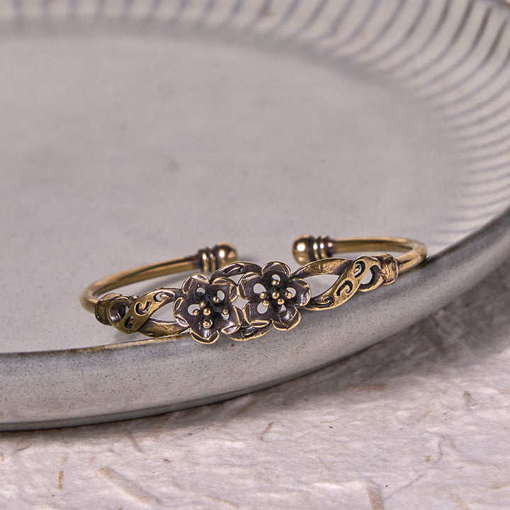 Brazalete de cobre y latón con Buddha Stones, flores, hojas y suerte para la curación