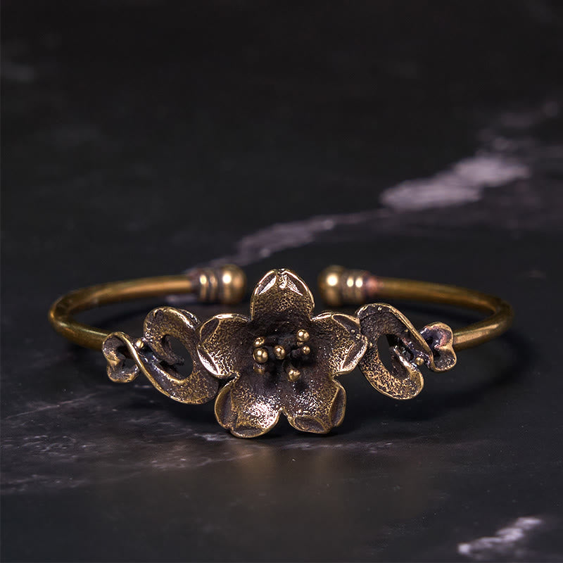 Brazalete de cobre y latón con Buddha Stones, flores, hojas y suerte para la curación