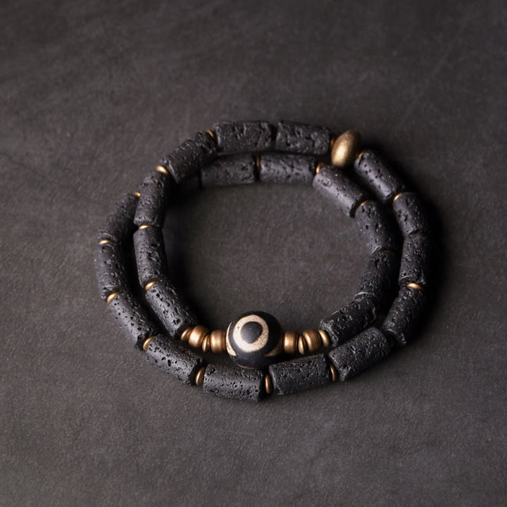 Pulsera de calma con múltiples vueltas de latón y cobre con cuentas Dzi de tres ojos y piedra de lava vintage de Buddha Stones
