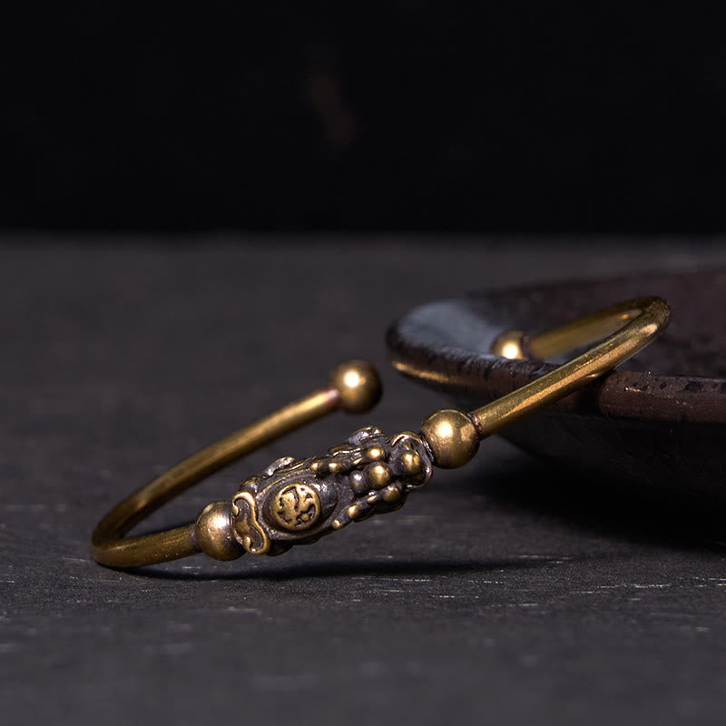 Pulsera de cobre y latón con Buddha Stones Pi Xiu y brújula que lleva el personaje Fu