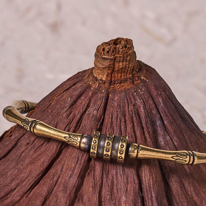 Pulsera de la paz de latón y cobre con flor de loto de bambú y Buddha Stones
