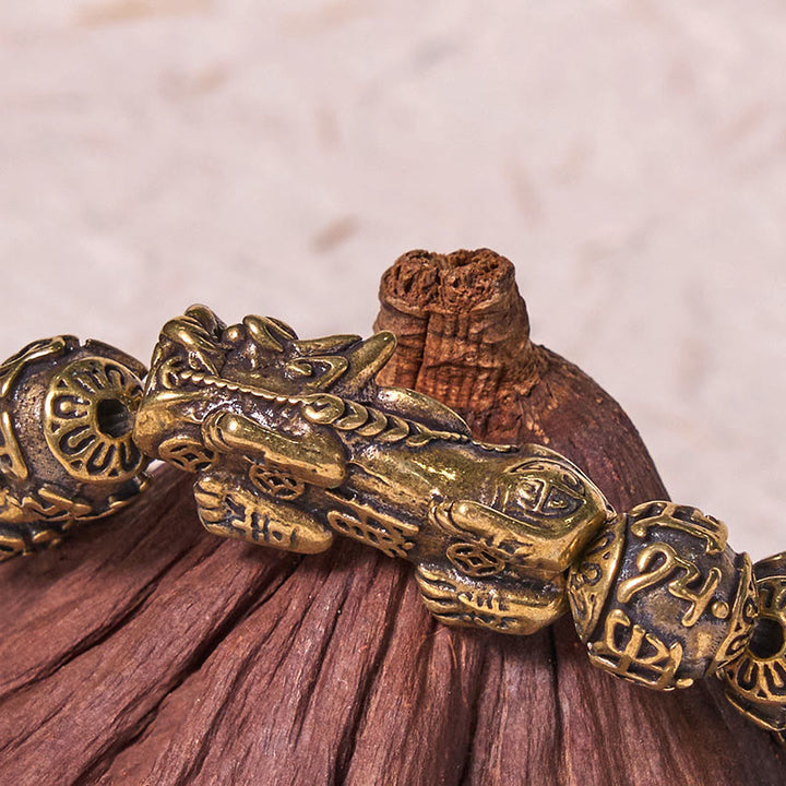 Pulsera de riqueza con cuentas de cobre y seis palabras verdaderas 'Om Mani Padme Hum' con Buddha Stones Pi Xiu y el carácter Fu