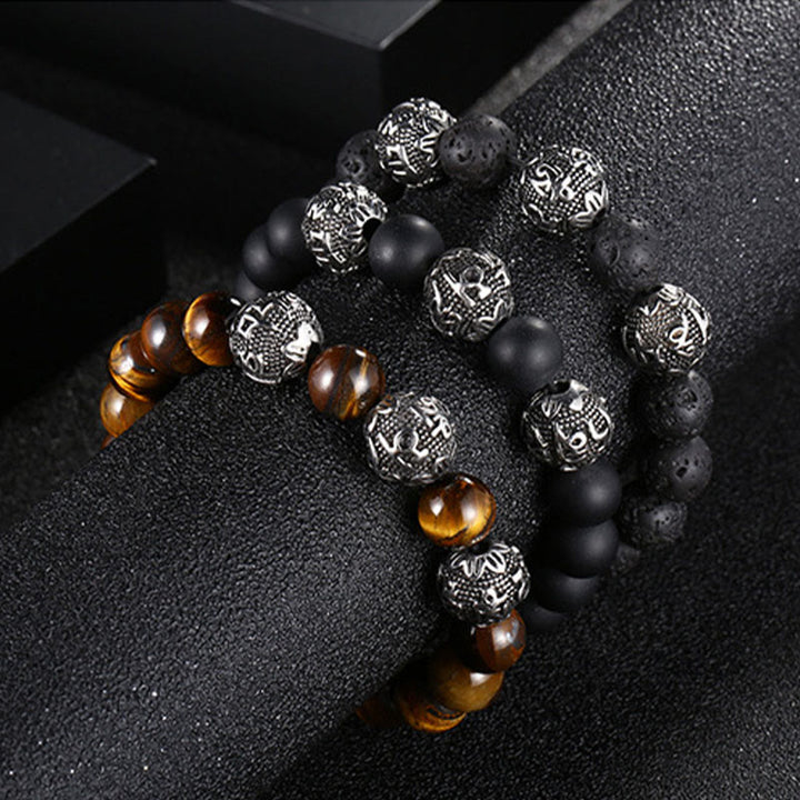 Pulsera de protección Om Mani Padme Hum de seis palabras verdaderas con Buddha Stones, ojo de tigre natural, roca de lava, obsidiana negra y acero de titanio