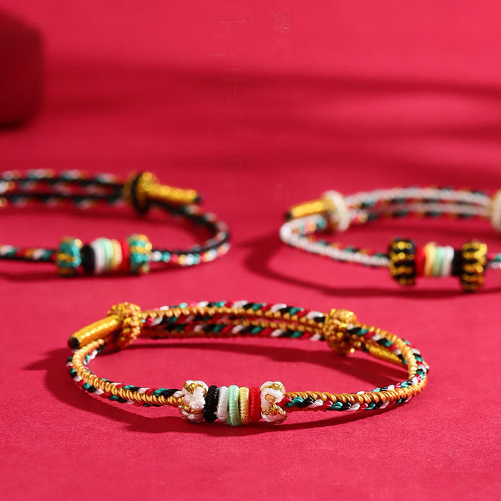 Pulsera trenzada con nudo de arrecife y nudo completo con cinco elementos y Buddha Stones