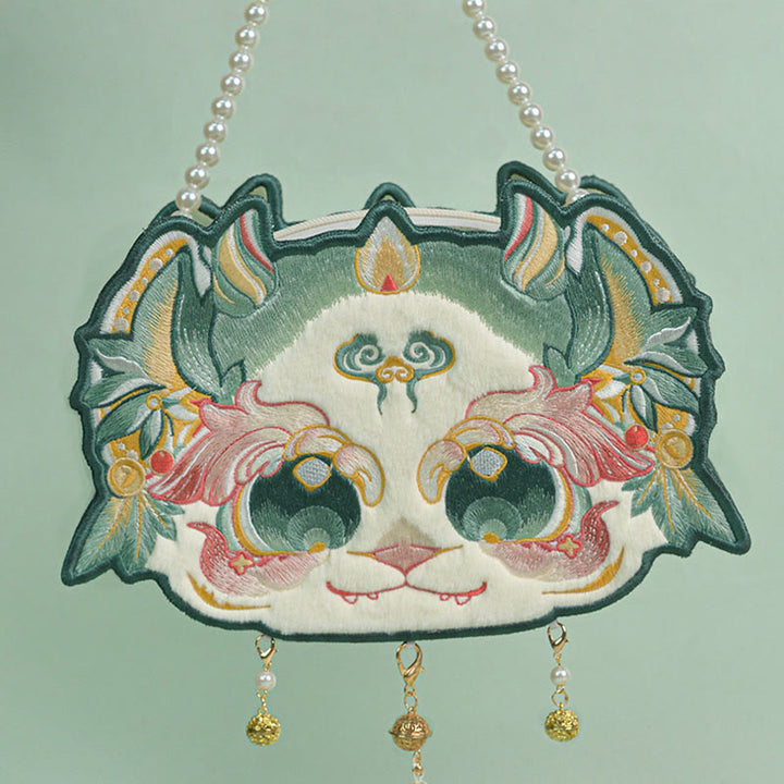 Bolso bandolera con borlas y cadena de perlas bordadas Bai Ze con bestia mítica de doble cara y Buddha Stones