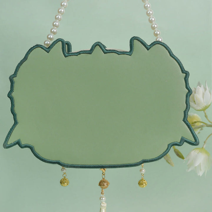 Bolso bandolera con borlas y cadena de perlas bordadas Bai Ze con bestia mítica de doble cara y Buddha Stones