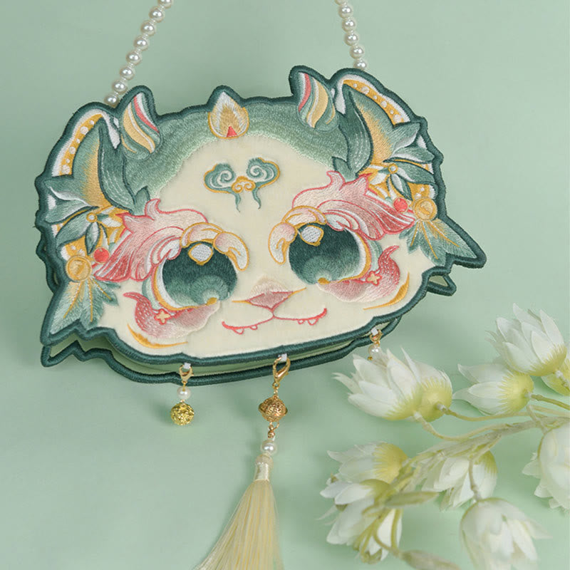 Bolso bandolera con borlas y cadena de perlas bordadas Bai Ze con bestia mítica de doble cara y Buddha Stones