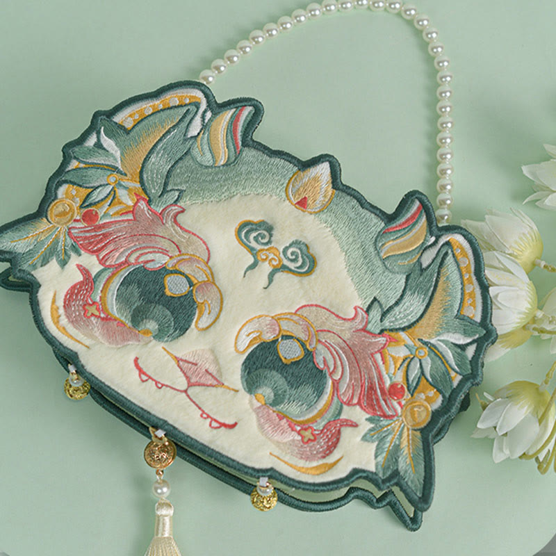 Bolso bandolera con borlas y cadena de perlas bordadas Bai Ze con bestia mítica de doble cara y Buddha Stones