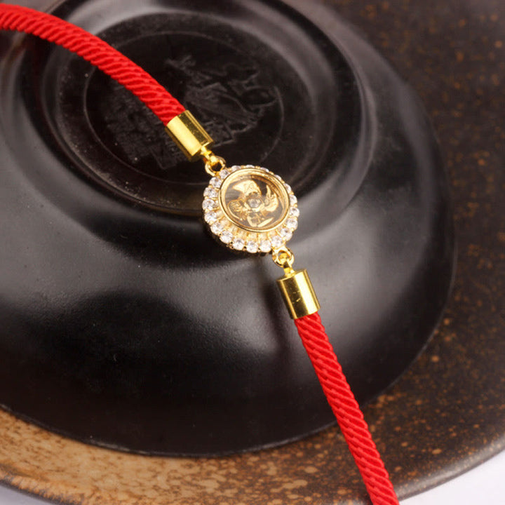 Pulsera trenzada con protección de Qi Feng Sheng Shui con molino de viento giratorio de cobre y latón con hilo rojo y Buddha Stones