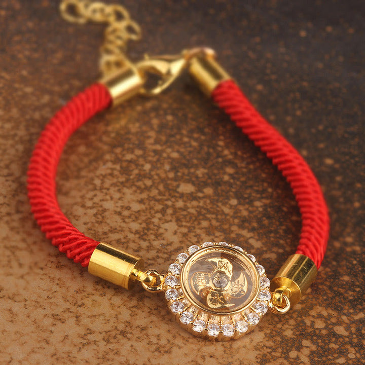 Pulsera trenzada con protección de Qi Feng Sheng Shui con molino de viento giratorio de cobre y latón con hilo rojo y Buddha Stones