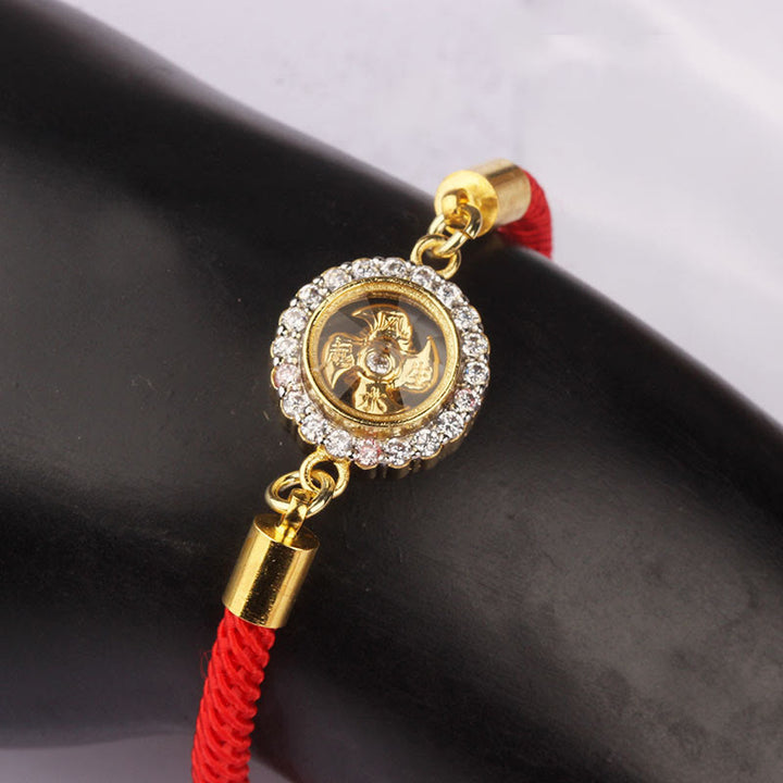Pulsera trenzada con protección de Qi Feng Sheng Shui con molino de viento giratorio de cobre y latón con hilo rojo y Buddha Stones