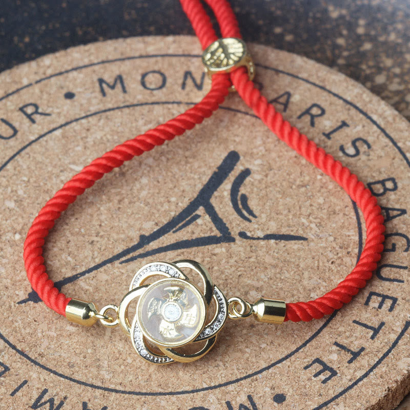 Pulsera trenzada con protección de Qi y Feng Sheng Shui con molino de viento de cobre y latón con hilo rojo ciruela giratorio y Buddha Stones