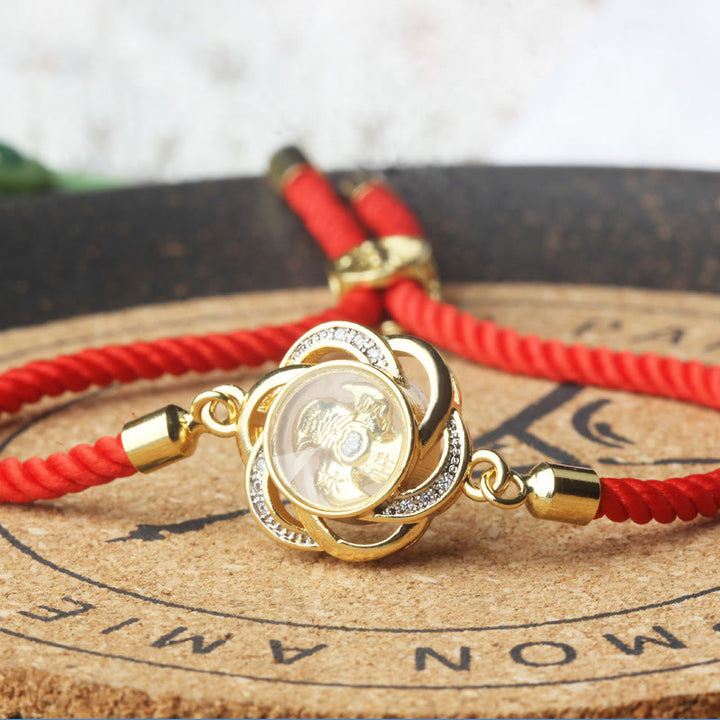 Pulsera trenzada con protección de Qi y Feng Sheng Shui con molino de viento de cobre y latón con hilo rojo ciruela giratorio y Buddha Stones