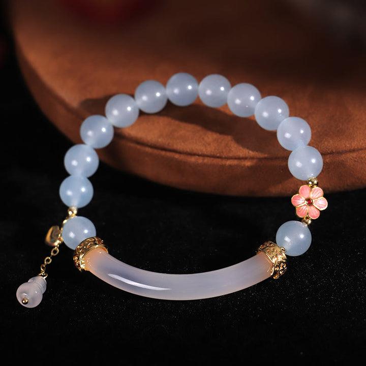 Brazalete tipo brazalete con Buddha Stones, cristal rosa, calcedonia azul y perla