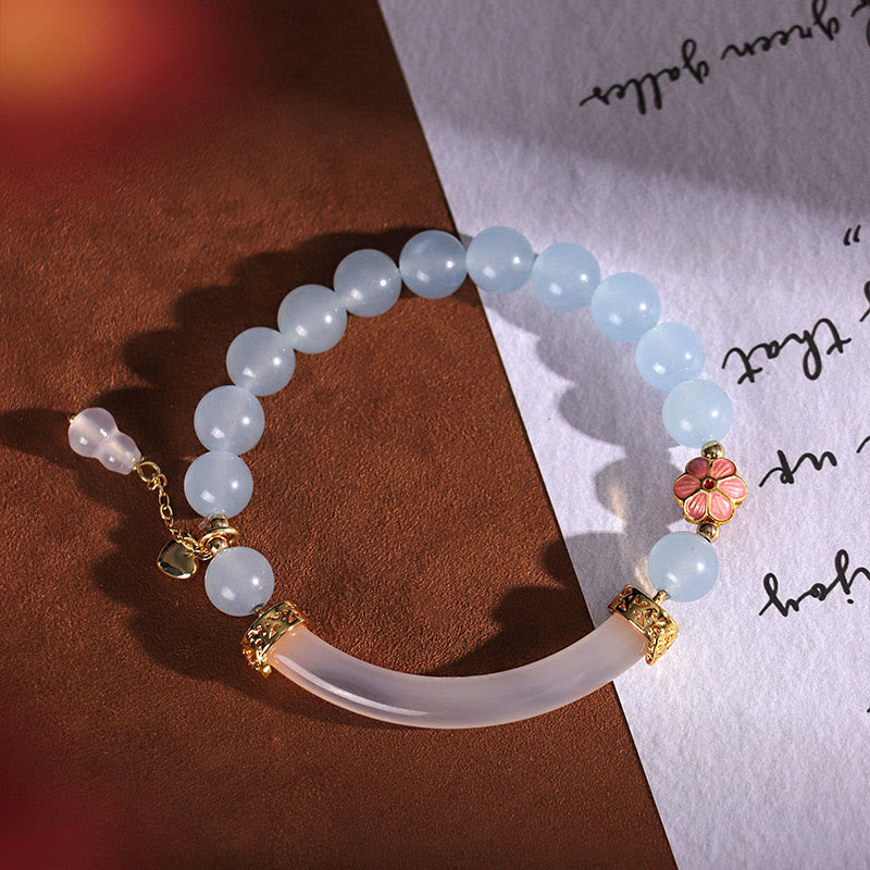 Brazalete tipo brazalete con Buddha Stones, cristal rosa, calcedonia azul y perla