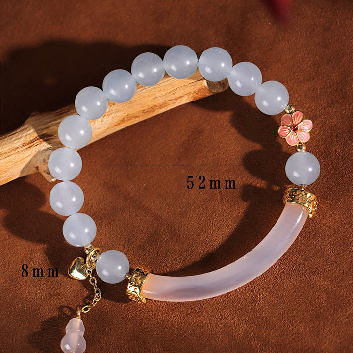 Brazalete tipo brazalete con Buddha Stones, cristal rosa, calcedonia azul y perla
