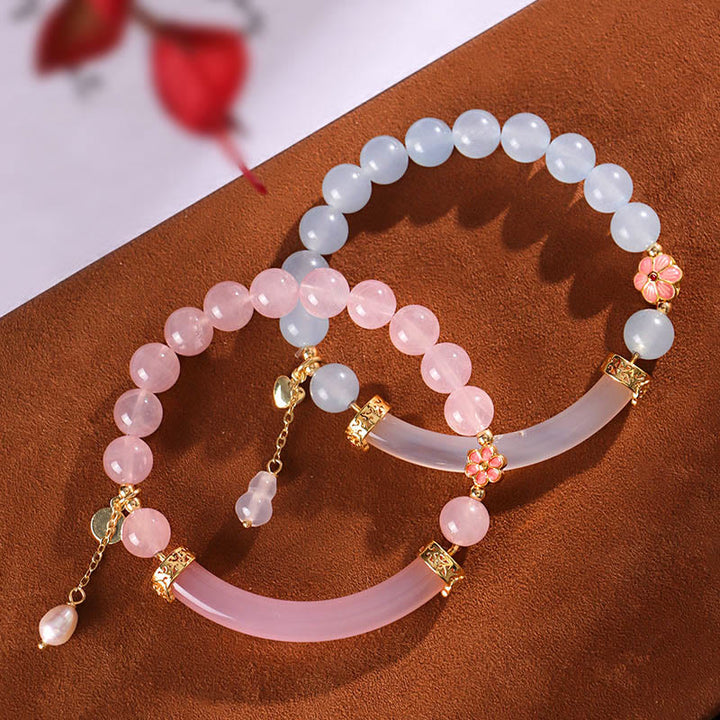 Brazalete tipo brazalete con Buddha Stones, cristal rosa, calcedonia azul y perla