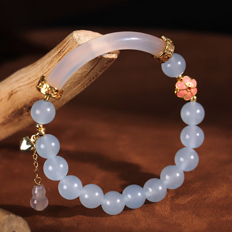 Brazalete tipo brazalete con Buddha Stones, cristal rosa, calcedonia azul y perla